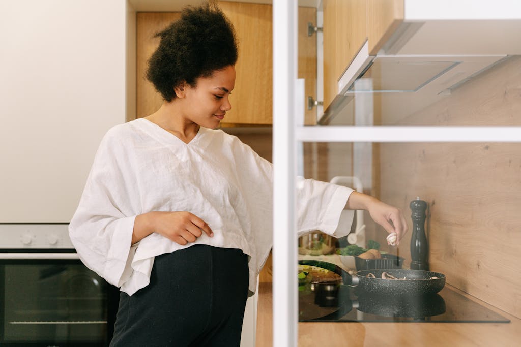 A Woman Cooking in the Kitchen